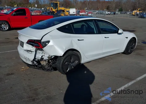 2021 Tesla Model 3 Standard Range Plus Rear-Wheel Drive from USA, damaged, VIN 5YJ3E1EA7MF991548